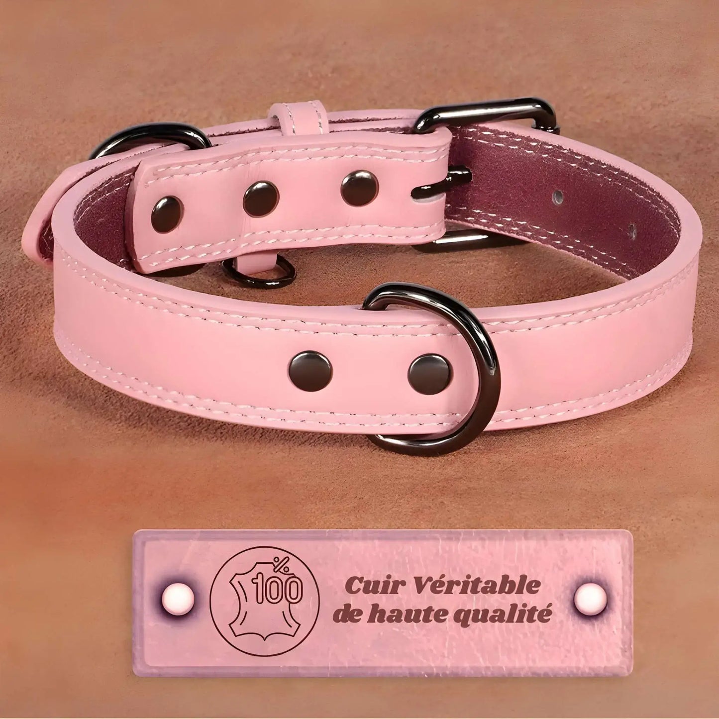 Un collier pour chien de couleur rose en cuir véritable.