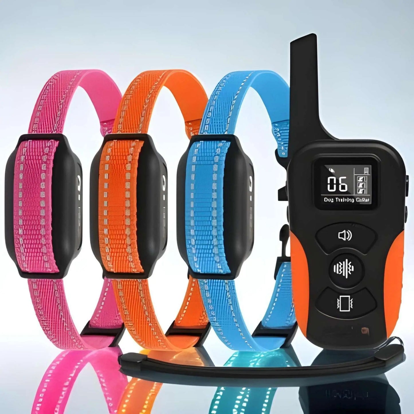 Un kit de trois colliers rose, orange et bleu du collier de dressage pour chien avec une télécommande