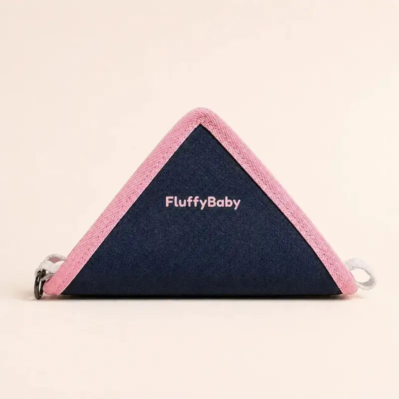 Une gamelle pour chien pliable de couleur rose.
