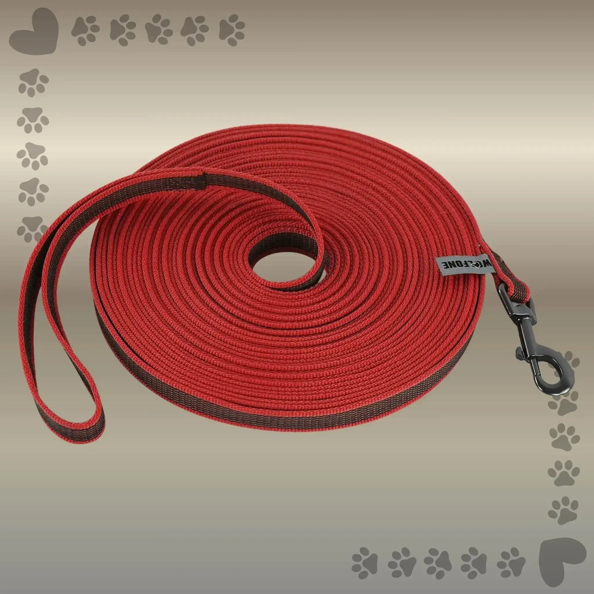 Une laisse pour chien de couleur rouge imperméable.