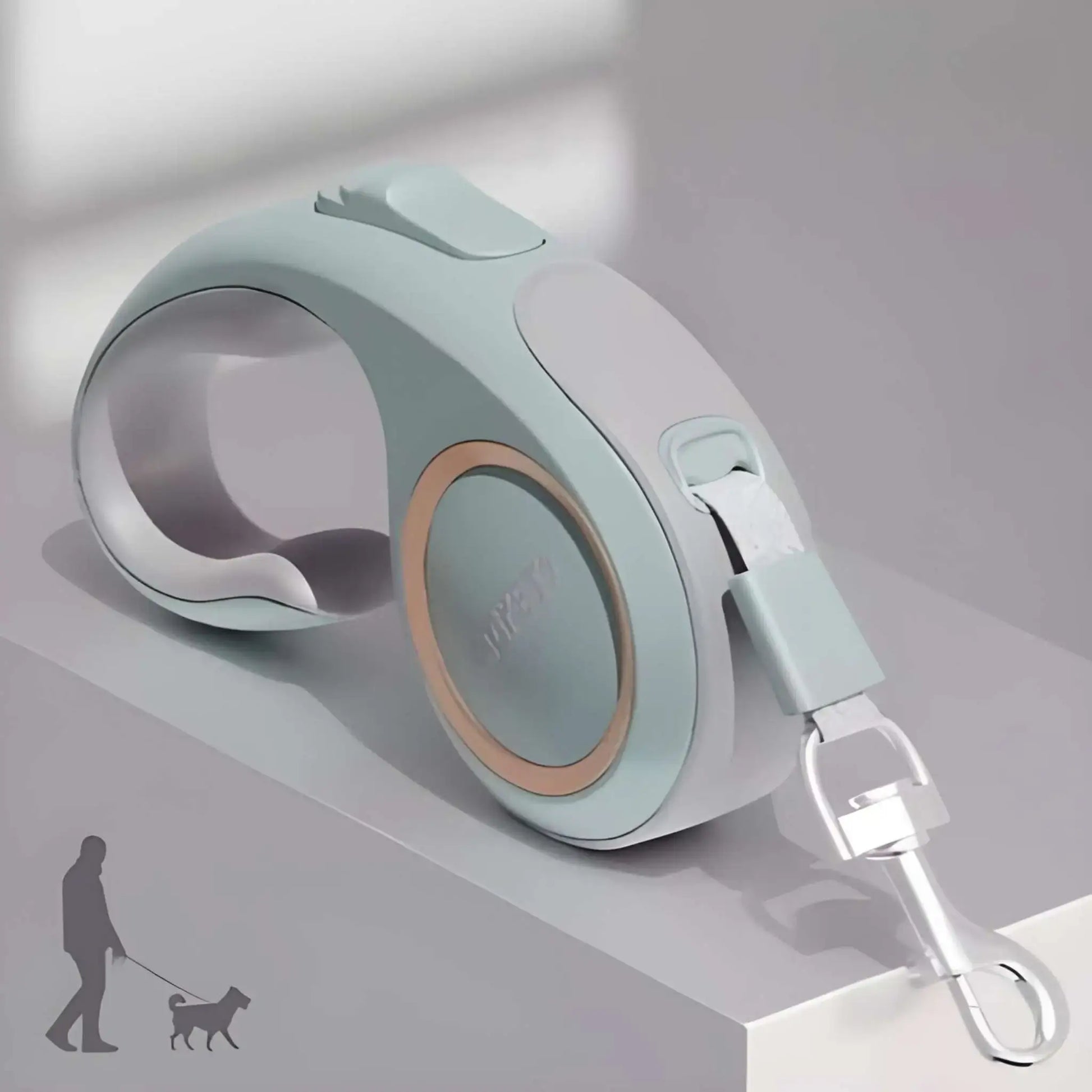 Une laisse enrouleur pour chien de couleur turquoise.