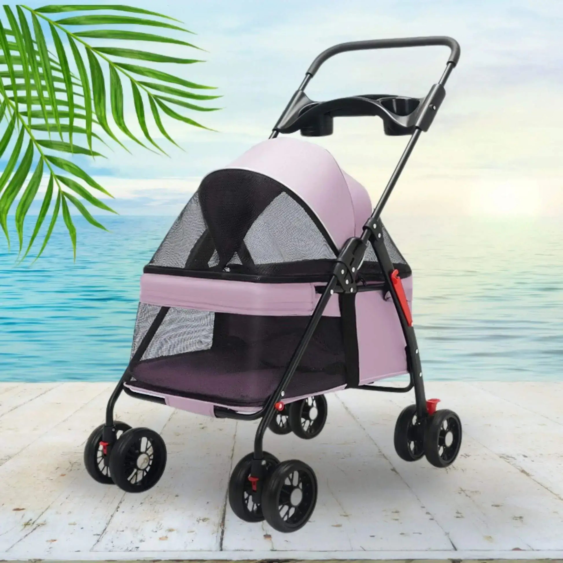Une poussette rose sur un quai à la plage.