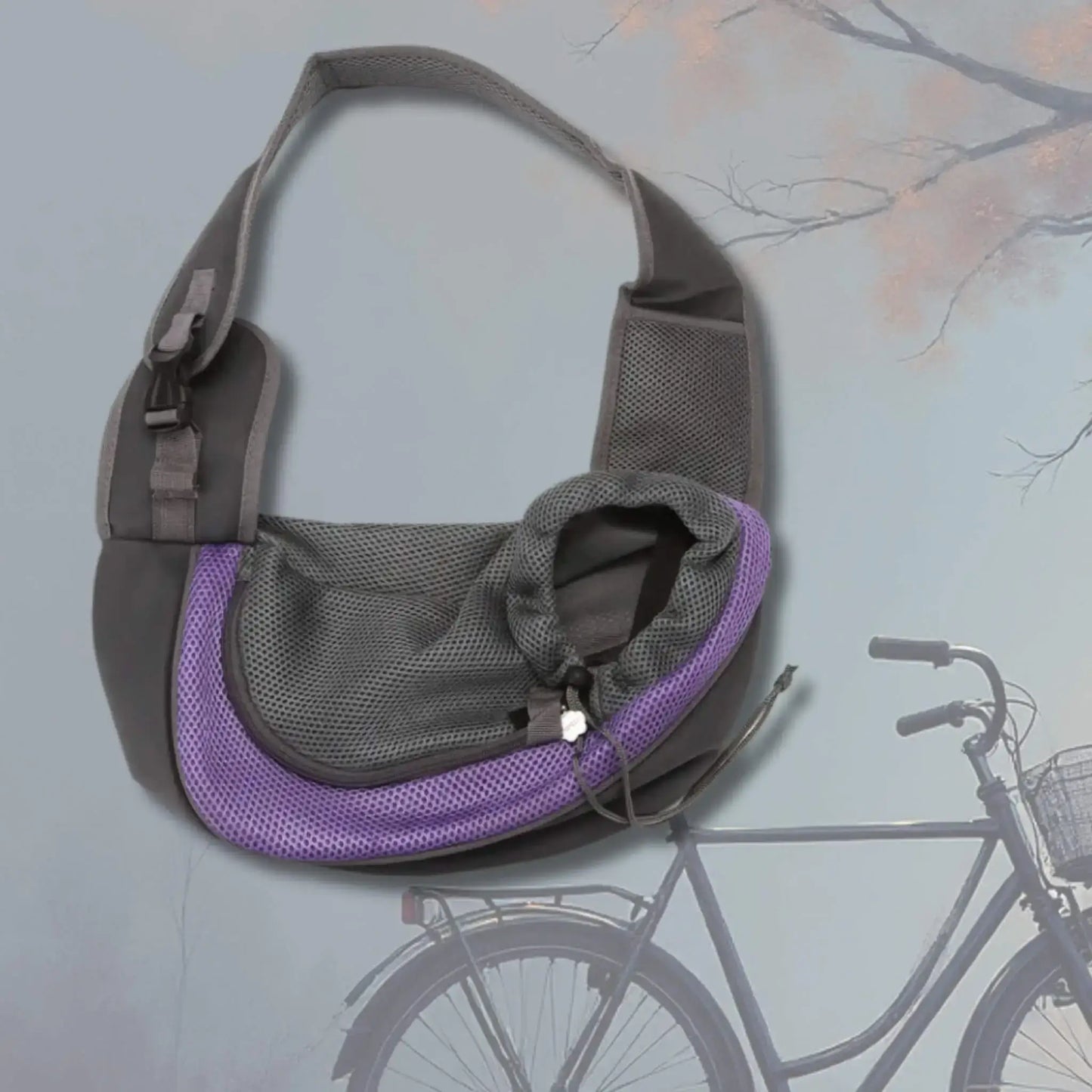 Un sac de transport pour chien violet avec un vélo.