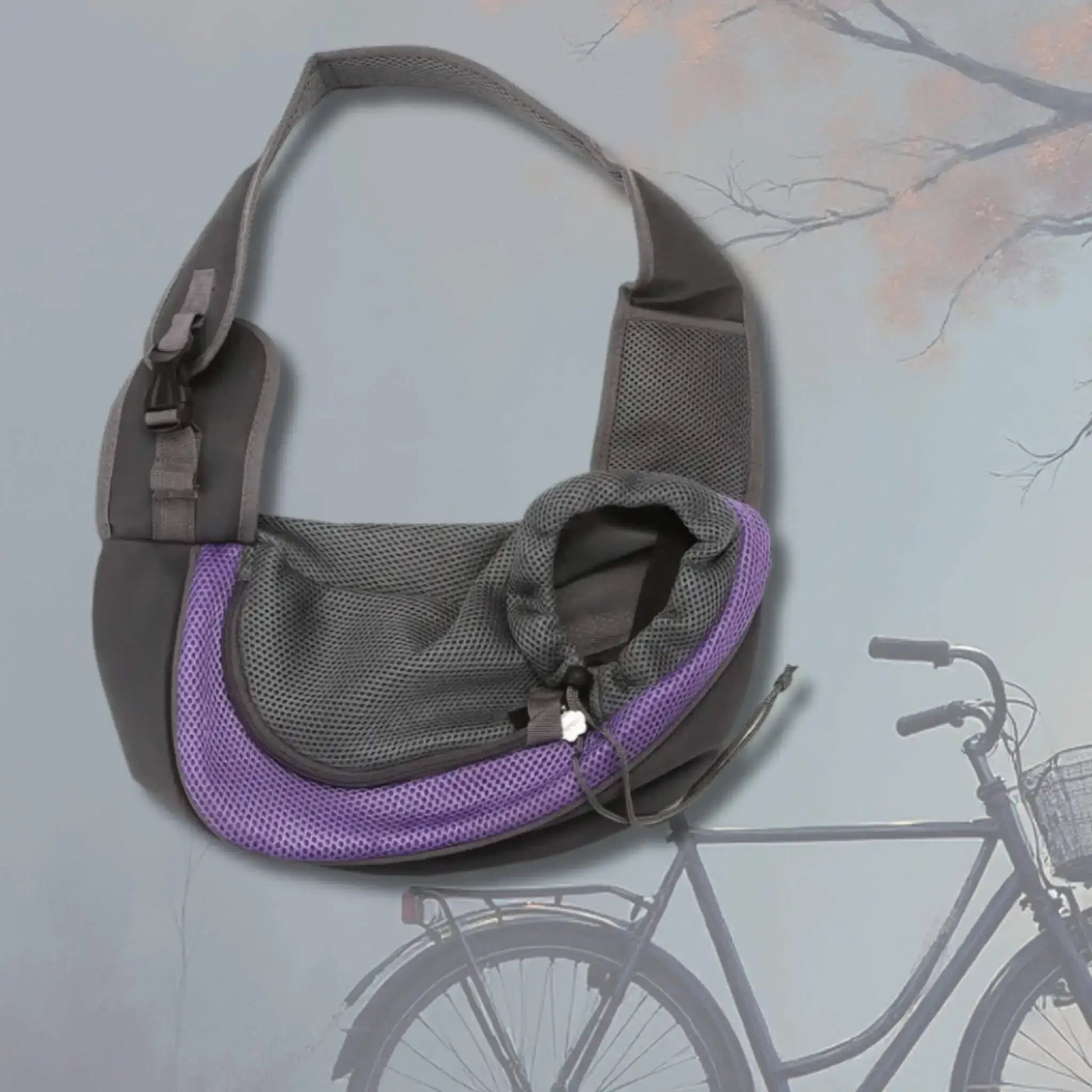 Un sac de transport pour chien violet avec un vélo.