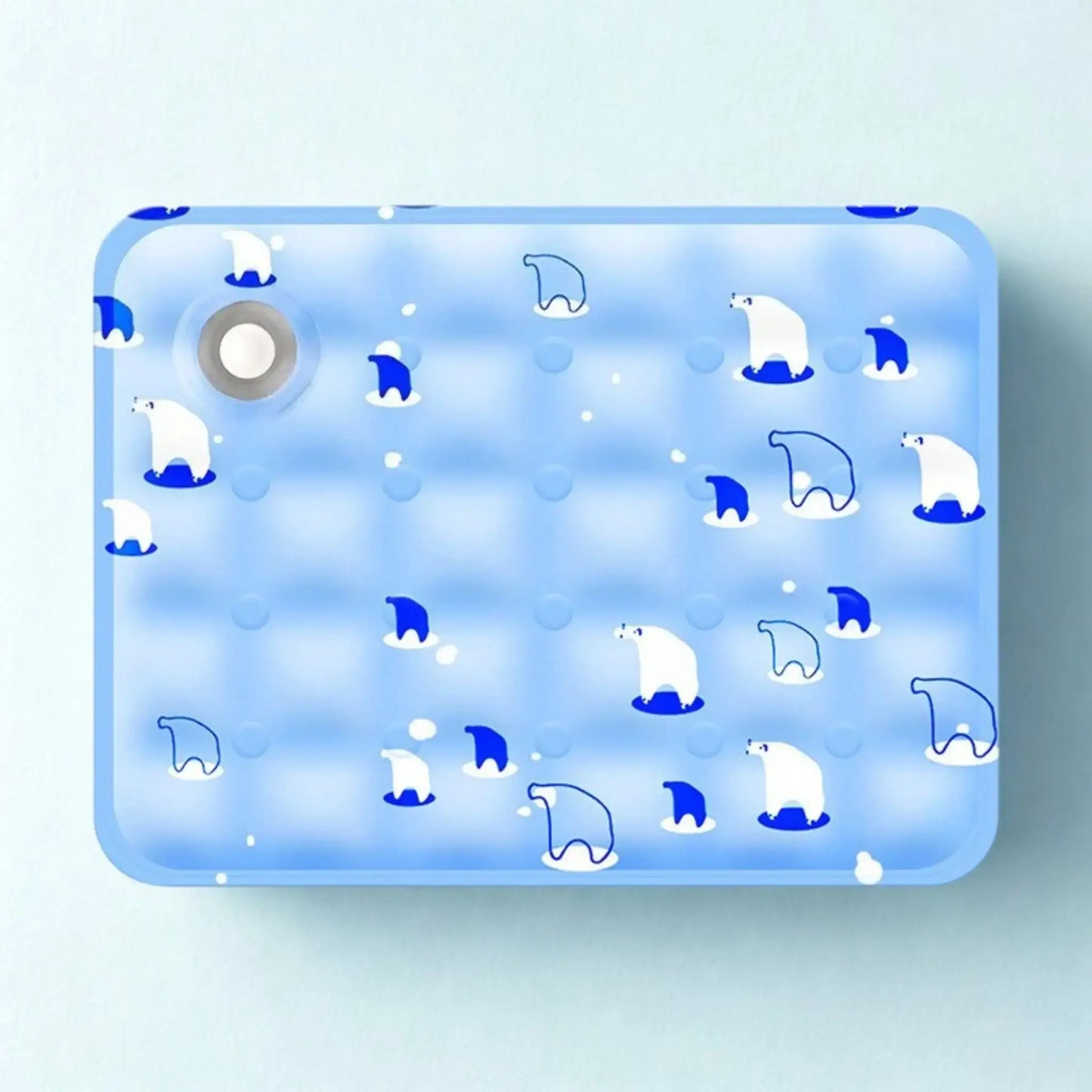 Un tapis réfrigérant bleu pâle avec motif d'ours polaire.